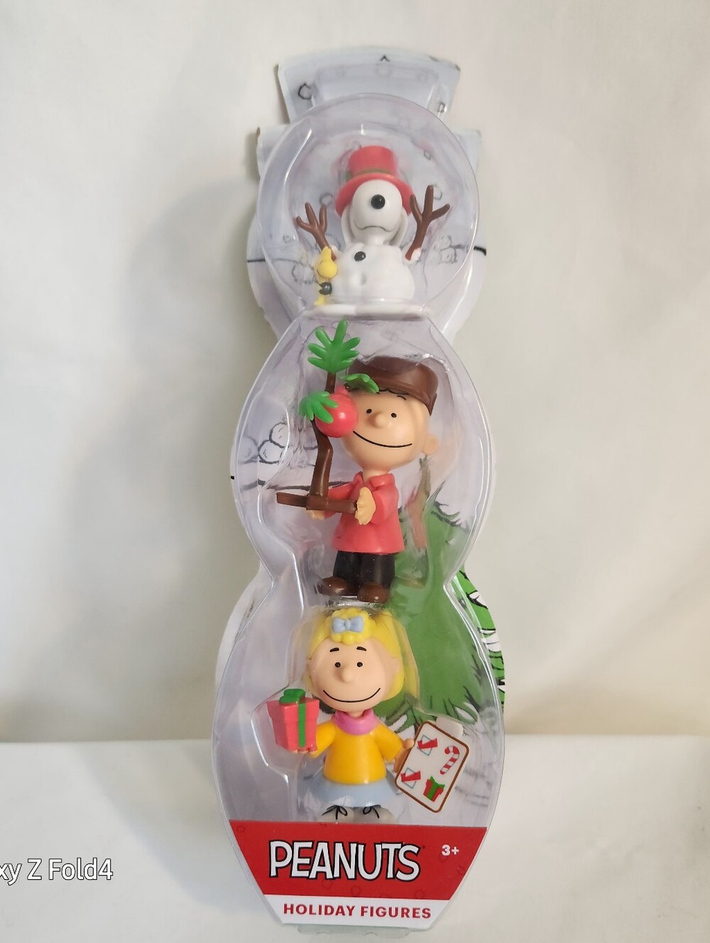 Peanuts Holiday Figure Set - Red, Yellow, White, Brown